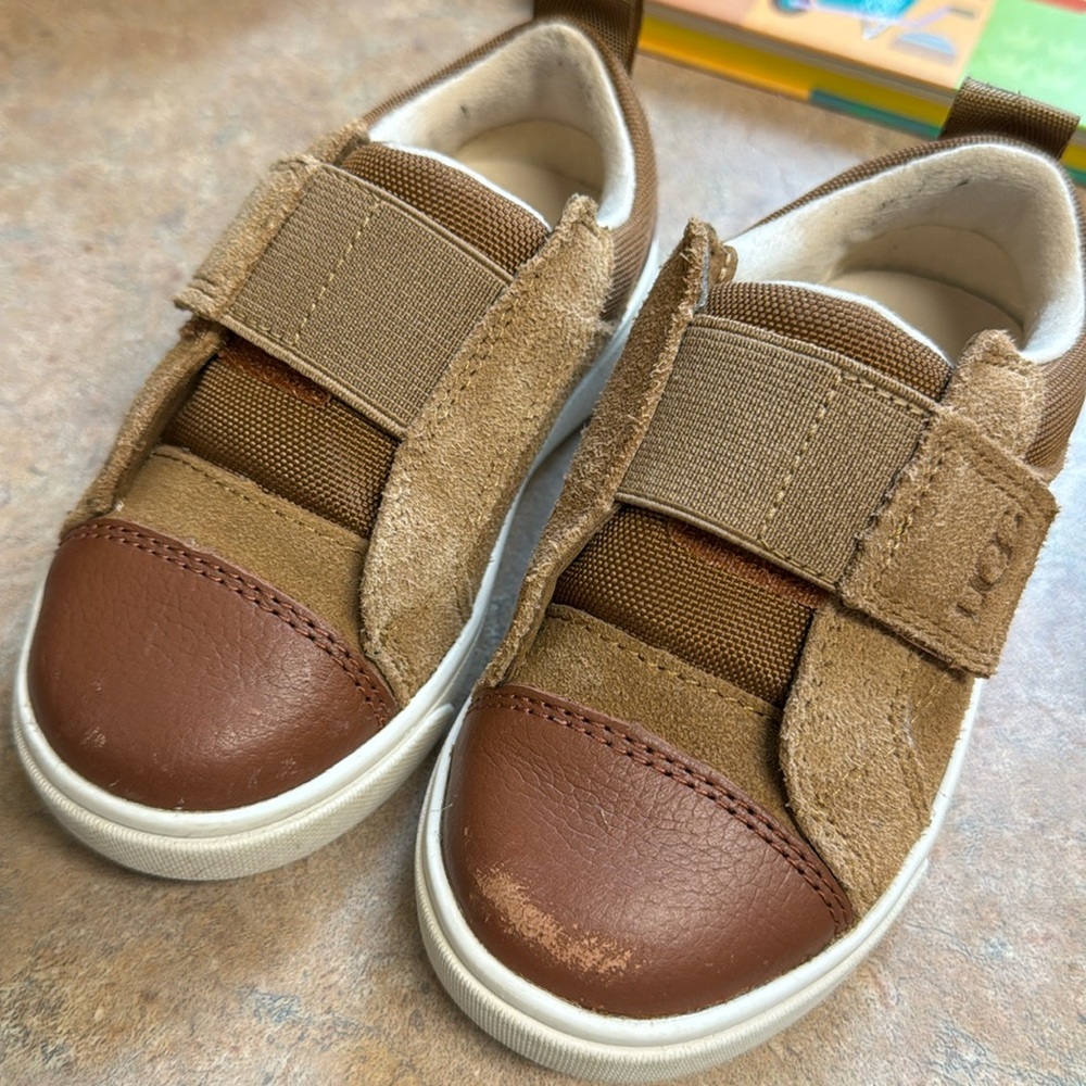 Worn once, have a scuff on the top left shoe.